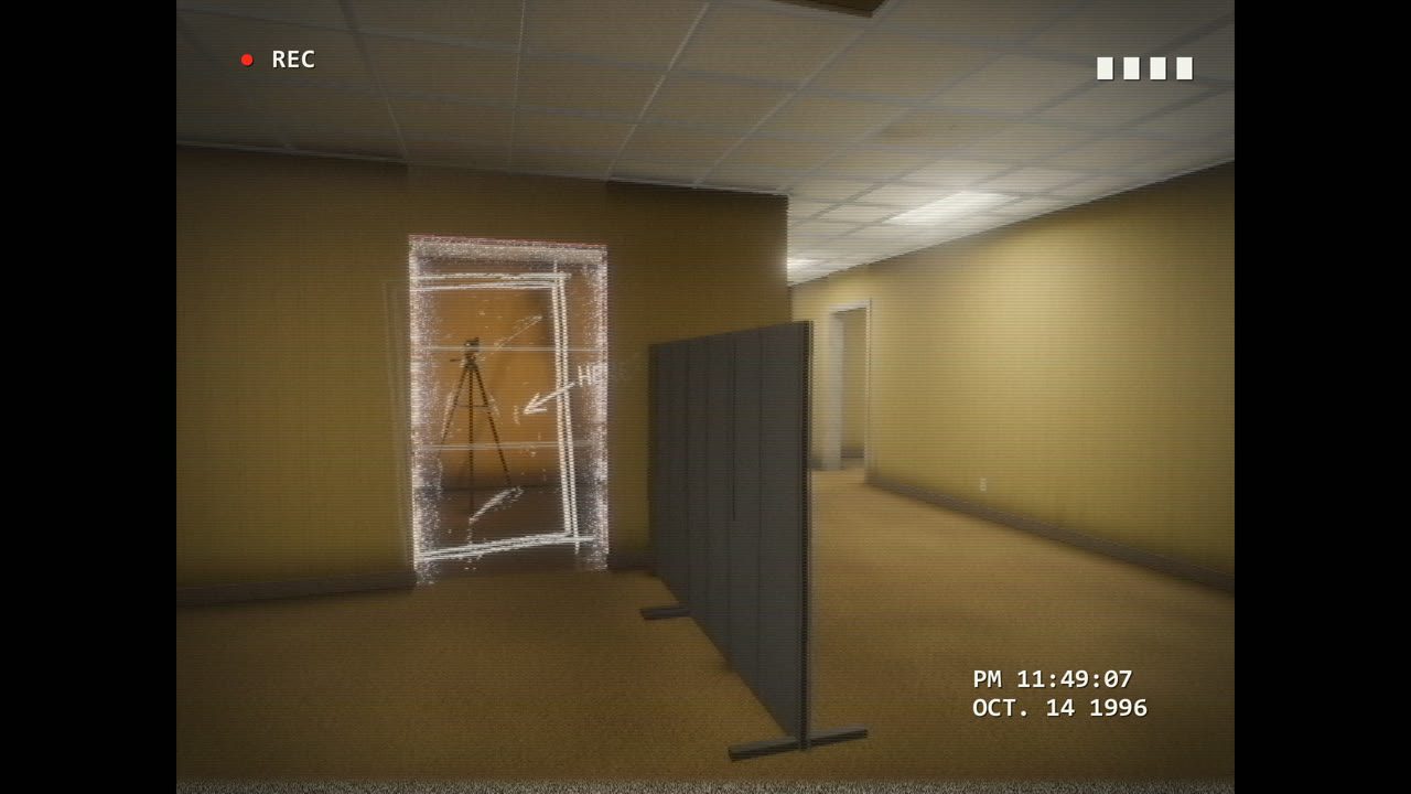 A chalk door outline glowing on a wall in the camcorder view