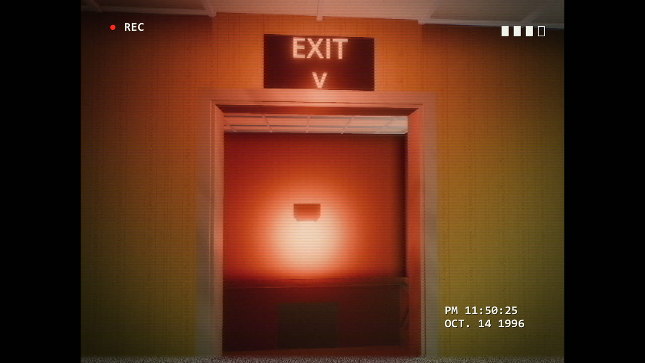 A red EXIT sign glowing over a stairwell door