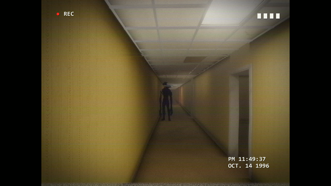 A dark figure standing at the end of a yellow corridor
