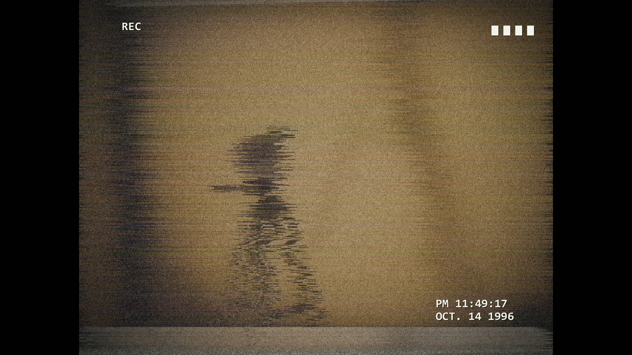A smeared figure breaking up in tape noise